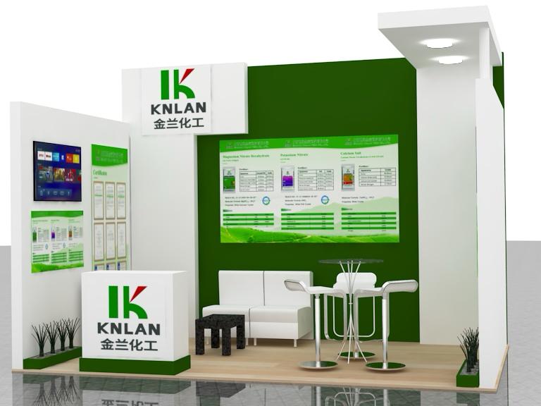Stand modular verde y blanco con áreas de presentación